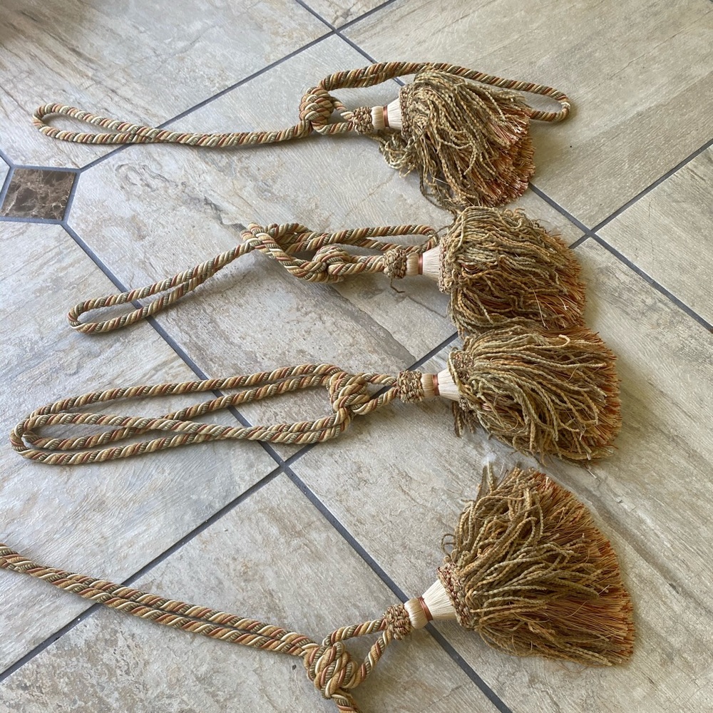 Four curtain tassels
